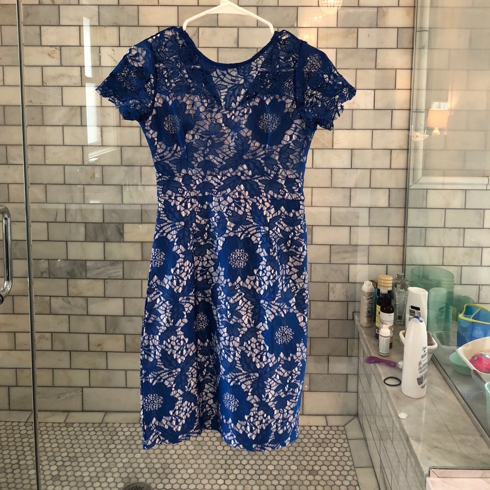 NEW with the tags still on. Colbalt lace dress.